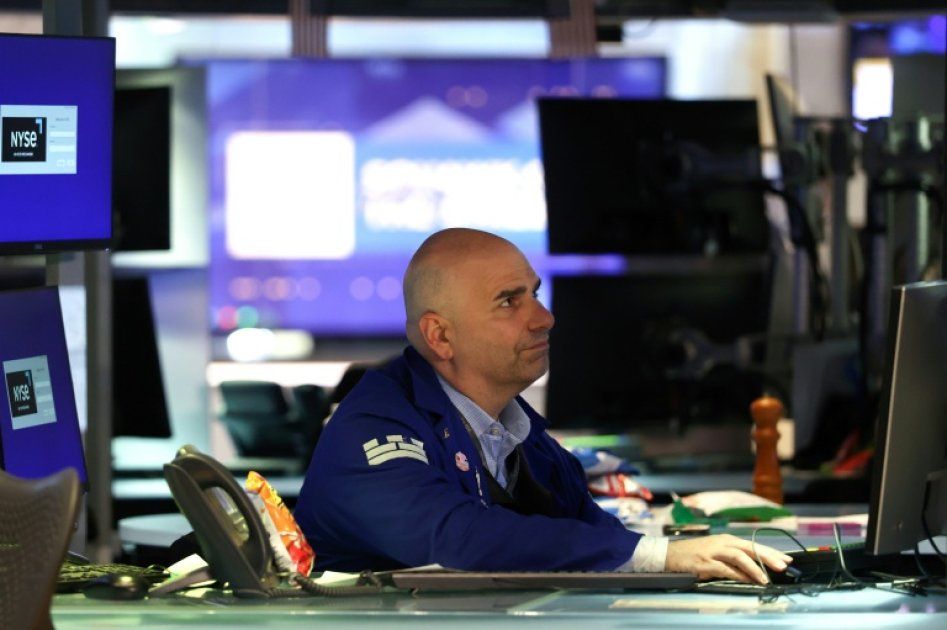 Wall Street en attente : tensions internationales et résultats d'entreprises en ligne de mire